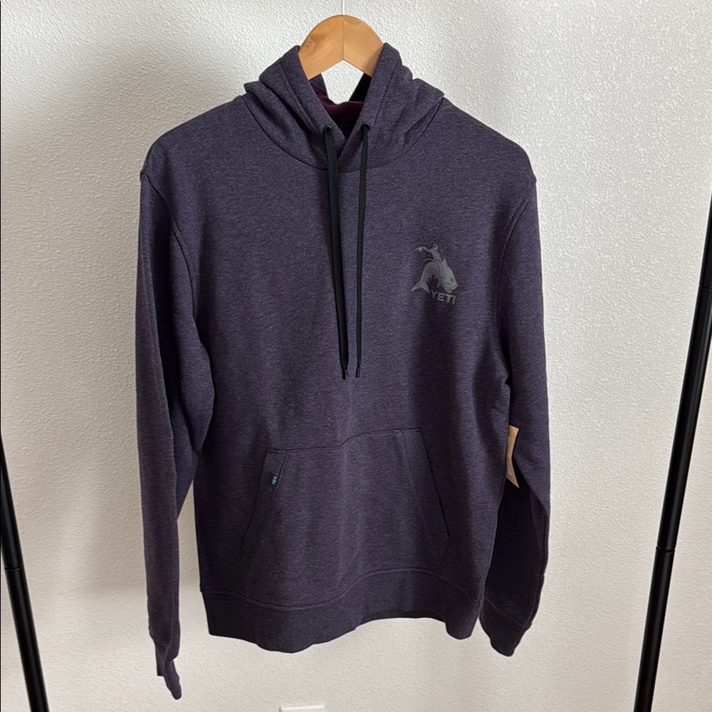 YETI Heathered purple and grey fleece hoodie with front pockets